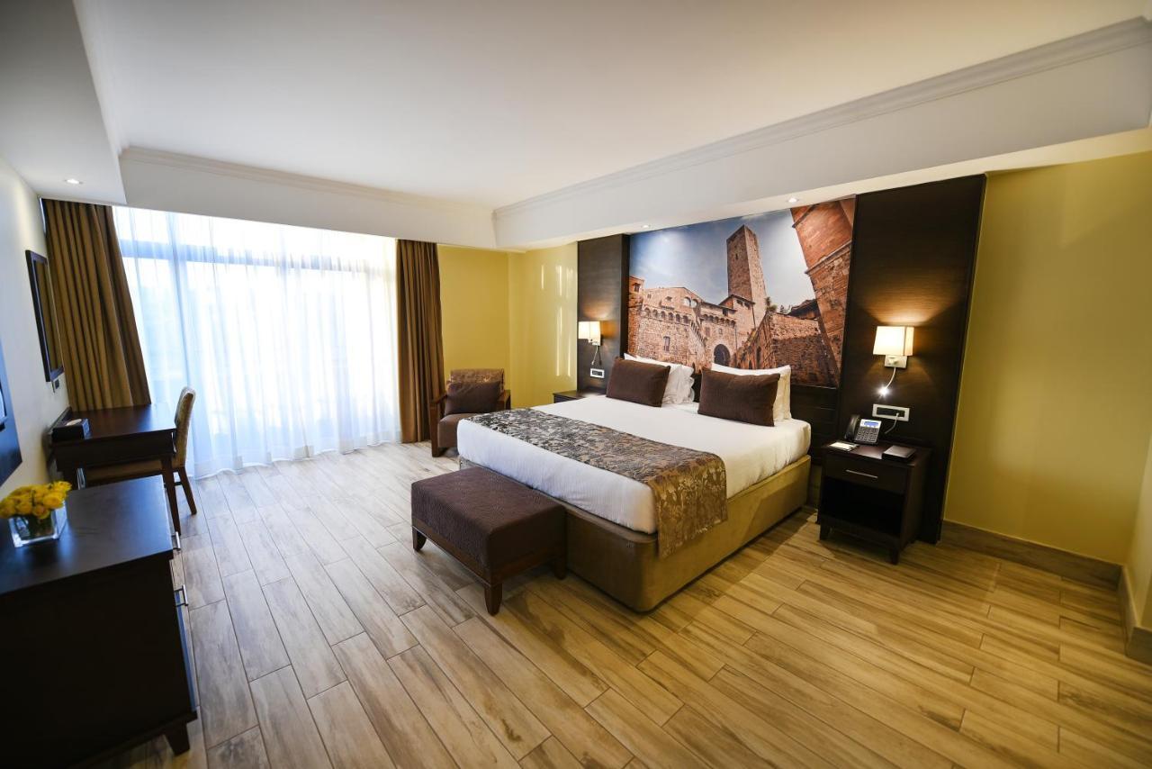 Mestil Hotel & Residences Кампала Экстерьер фото